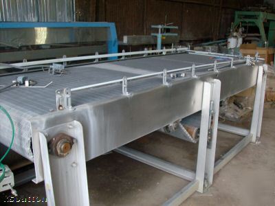 Stainless steel accumulation table size 4' w x 10' long