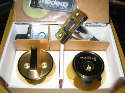 New in box medeco single cylinder deadbolt lock brass