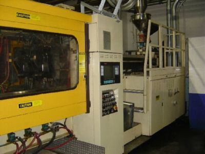 550 ton, 64.83 oz. husky injection molding machine '90