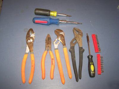 Lot of pliers and multi use screwdrivers hvac tools