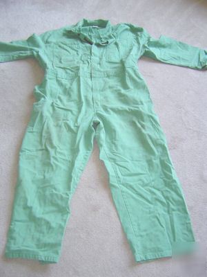 Flame retardant coveralls, size 4X, green. 